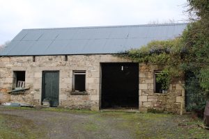 General pupose building built by Charlie's father in the 1930s featuring an early use of home-made concrete blocks